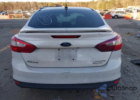 2012 Ford Focus Titanium z USA, uszkodzony, nr VIN 1FAHP3J20CL428059